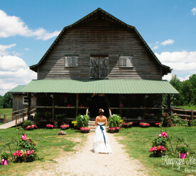 bride outside a farm house