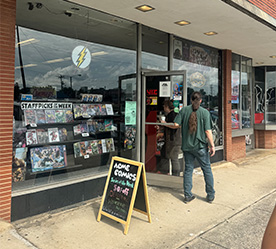 a guy going into the comic book store