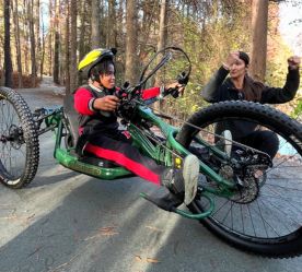 a boy on an adaptive bike