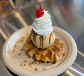 close-up of ice cream on a Belgium waffle