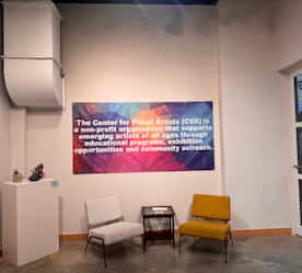 mission statement and seating inside the lobby area of the gallery