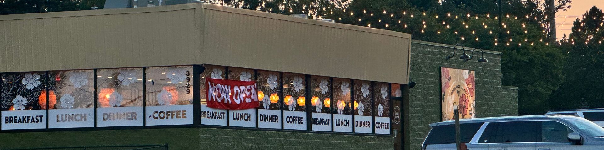 restaurant exterior in the evening with accent lighting