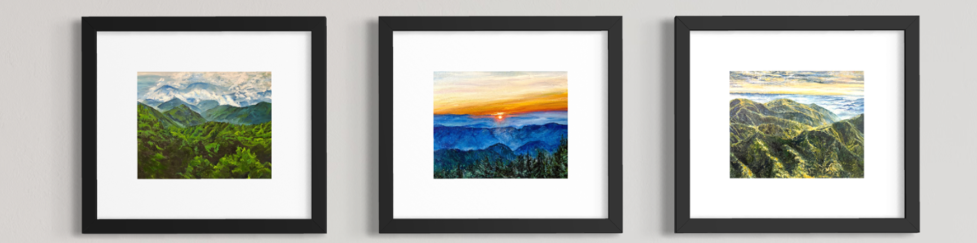 close up of three of her paintings