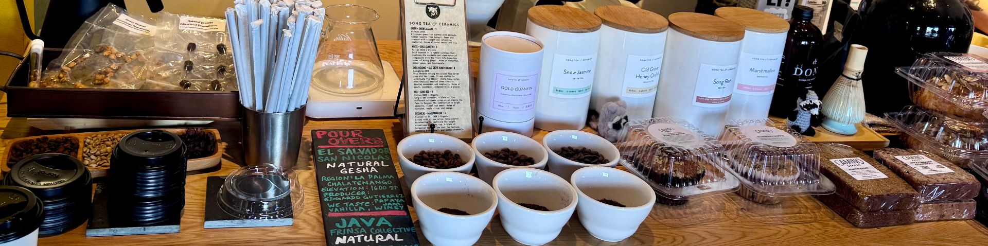 close-up of coffee beans & sweet treats