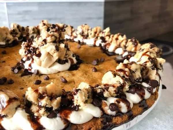 cookie cake with cookie dough frosting 