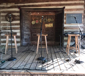stage on a farm shack