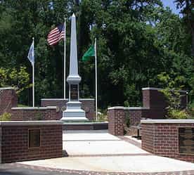 the memorial with flags around it
