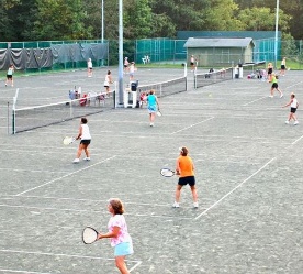 Families playing tennis