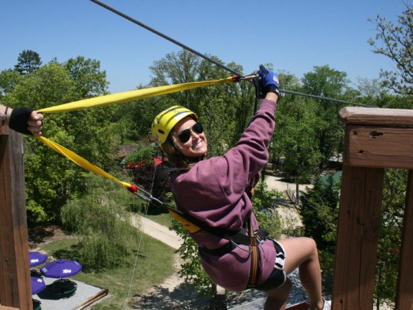 a girl on a zip line