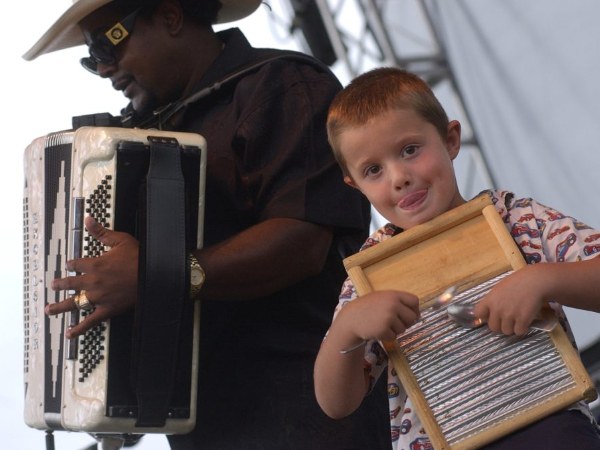 a little boy performing on stage