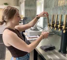 girl pouring beer