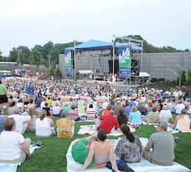 a crowd of people at the White Oak Amphitheater